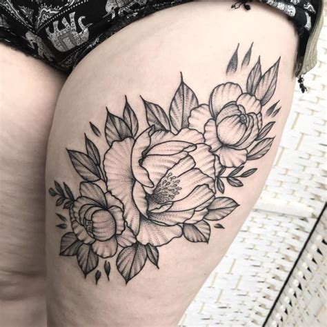 Tatuagem na coxa: 120 ideias para você pensar na。